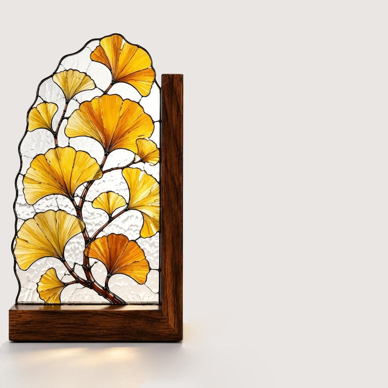 Ginkgoblattförmige Buchstütze aus Buntglas mit Holzsockel